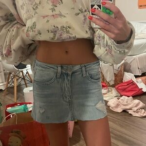 RSQ Mini denim skirt with a distressed look